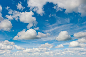 blue sky and fluffy clouds light