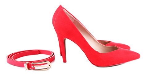 Beautiful red female shoes and belt, isolated on white