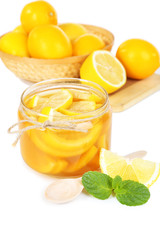 Tasty lemon jam isolated on white