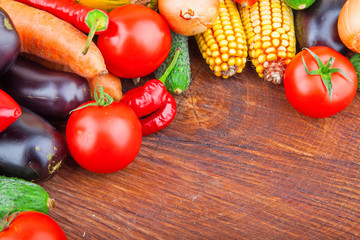 Autumn fresh vegetables on wooden background, food photo