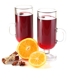 Mulled wine with oranges and spices isolated on white