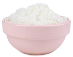 Cooked rice in bowl close up