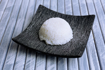 Cooked rice on wooden table