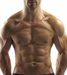 Bodybuilder with perfect abs, shoulders,biceps, triceps,chest