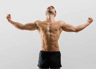 Fototapeta premium Bodybuilder with perfect abs, shoulders,biceps, triceps,chest