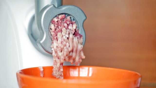 Meat grinder close up, preparation of forcemeat
