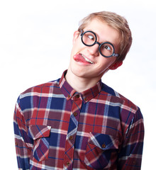 Young teen boy in nerd glasses.