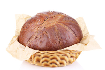 Rye bread in basket isolated on white