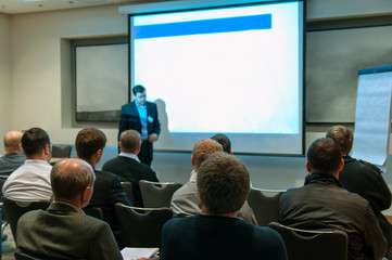 people seating at the business conference listening the lecture