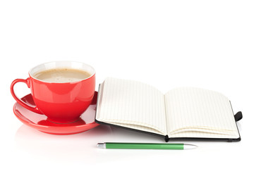 Coffee cup and office supplies
