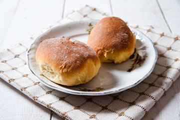Freshly baked sweet buns with jam