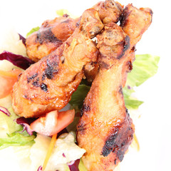 Fried chicken legs with side salad