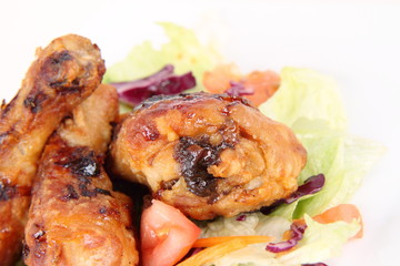 Fried chicken legs with side salad