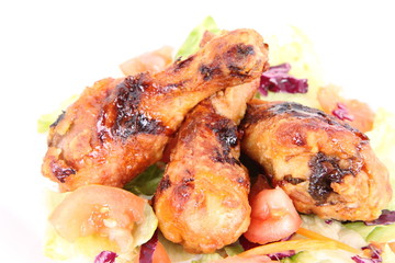 Fried chicken legs with side salad