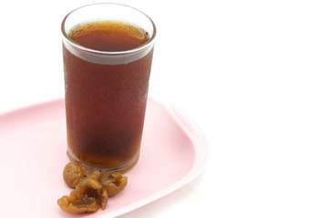 Longan juice on pink tray