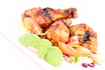 Fried chicken legs with side salad