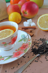 Tea cup with lemon