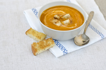 Pumpkin soup with croutons.