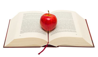Red apple on book