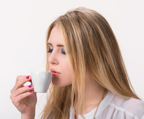 Beautiful girl enjoying coffee