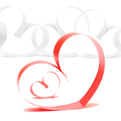 Ribbons shaped as hearts on white, valentines day concept