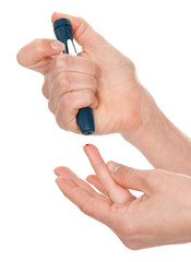 Diabetes diabetic concept finger prick measuring level blood