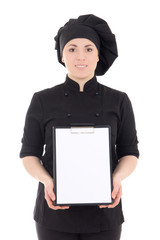 young cook woman in black uniform showing clipboard isolated on