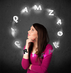 Young woman thinking with letter circulation around her head