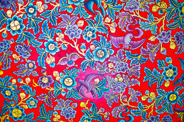 traditional Thai style art painting on Ceiling of the temple