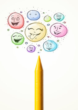 Smiley faces coming out of crayon