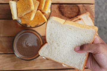 Toast with butter and sprinkling with sugar - hot coffee