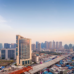 Obraz premium modern city with sunset