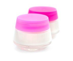 Cosmetic creams isolated on white background