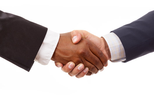 Handshake Between African And A Caucasian Business Man, Isolated