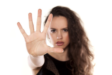 angry beautiful girl showing stop hand