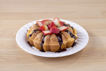 Homemade cake topping with strawberry and chocolate