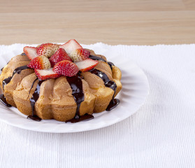 Homemade cake topping with strawberry and chocolate