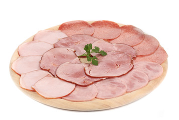 Chopped bacon and meat on plate.