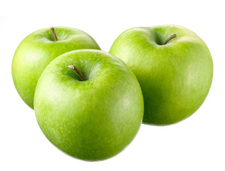 Green apples with leaves and flowers on white background
