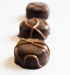 Tasty chocolate bonbon isolated on a white background