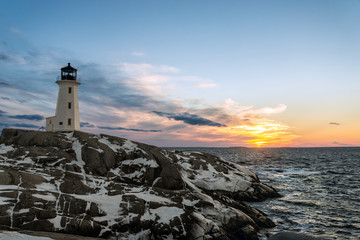 Fototapeta na wymiar Peggys Cove's Lighthouse at Sunset