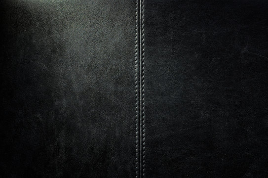 Black dark leather background or texture