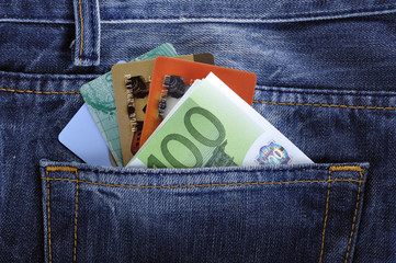 EURO and credit, debit card in the back jeans pocket