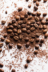 Coffee beans and particles of black chocolate