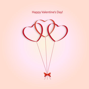 Hearts balloons on a pink background on Valentine's Day