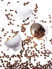 Falling coffee cups and beans