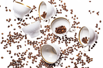 Falling coffee cups and beans