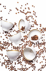 Falling coffee cups and beans