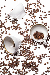 Falling coffee cups and beans