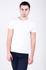Obraz premium Handsome young man on light background